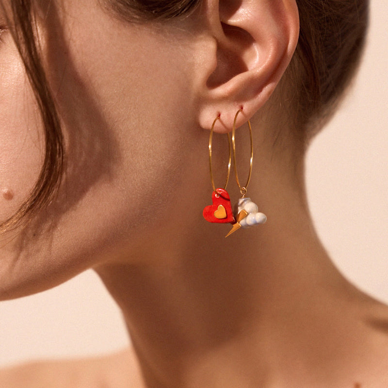 Handcrafted earrings from independent makers — artisan studs, hoops and statement pieces from the Sostter jewellery collection