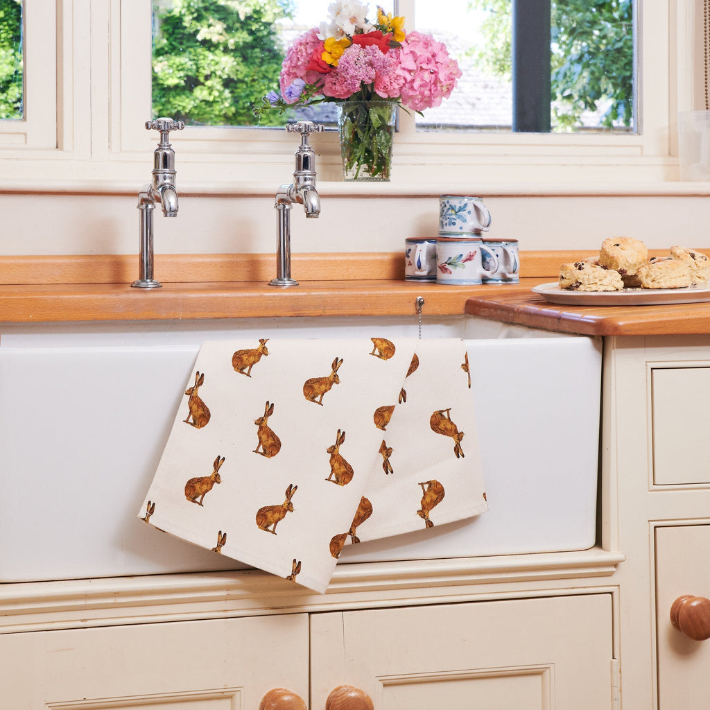 Lochs & Fens hand-drawn watercolour homeware — tea towels, mugs and candles featuring British wildlife designs by Isobel Irvine.