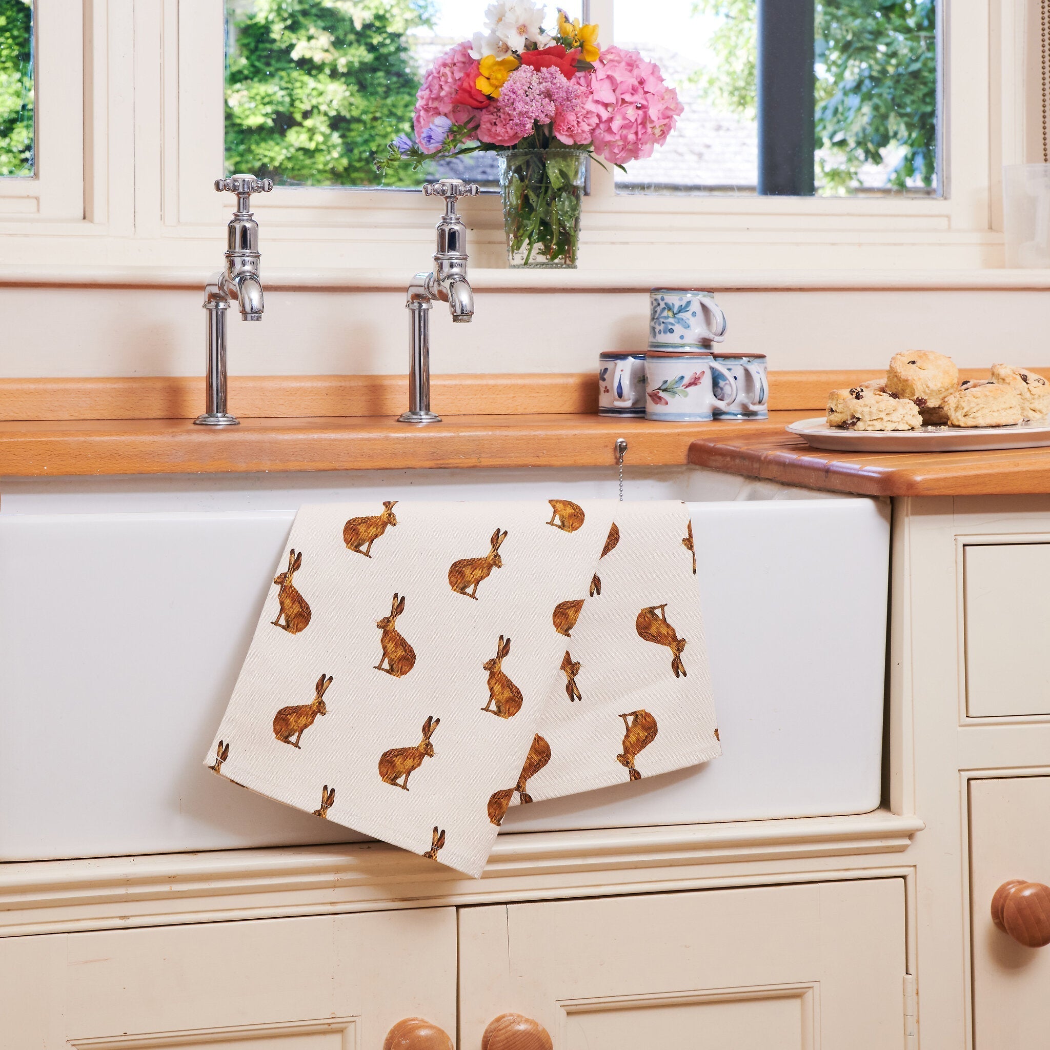 Lochs & Fens hand-drawn watercolour homeware — tea towels, mugs and candles featuring British wildlife designs by Isobel Irvine.