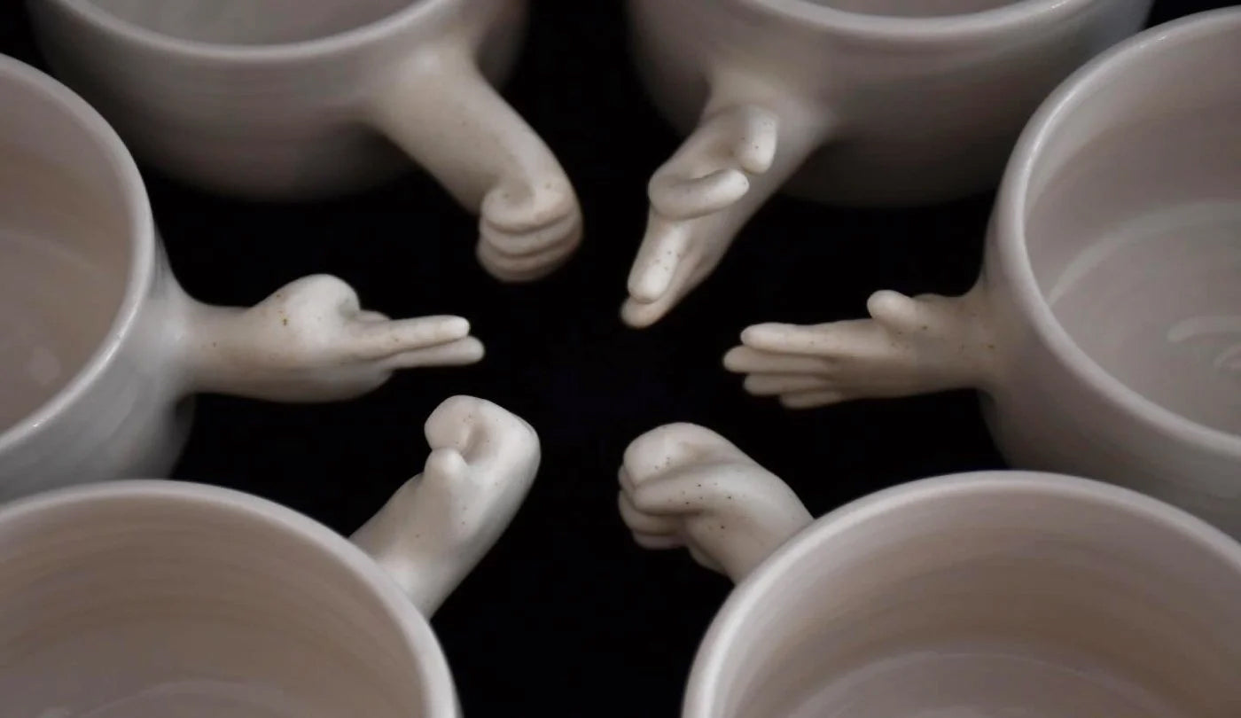 Hand-thrown ceramic mugs, artisan glassware and water bottles from independent makers — drinkware from the Sostter home collection