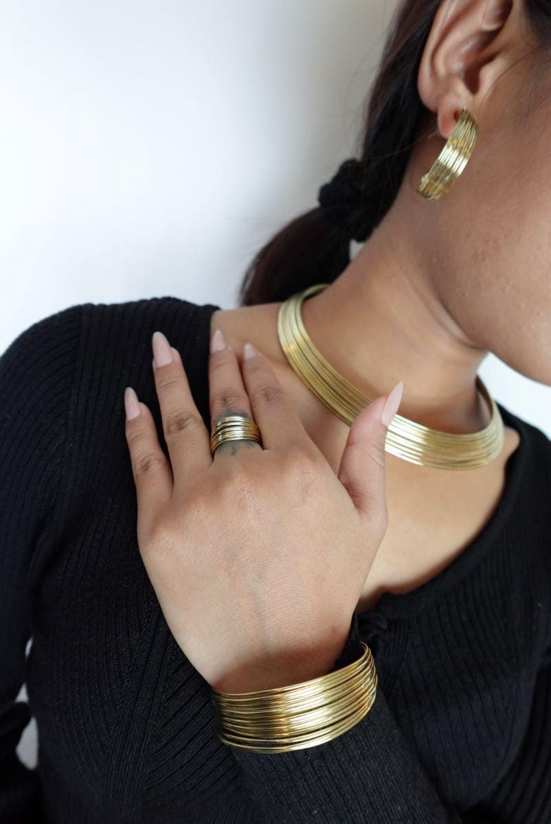 Four Piece Brass and Silver Statement Jewelry Set