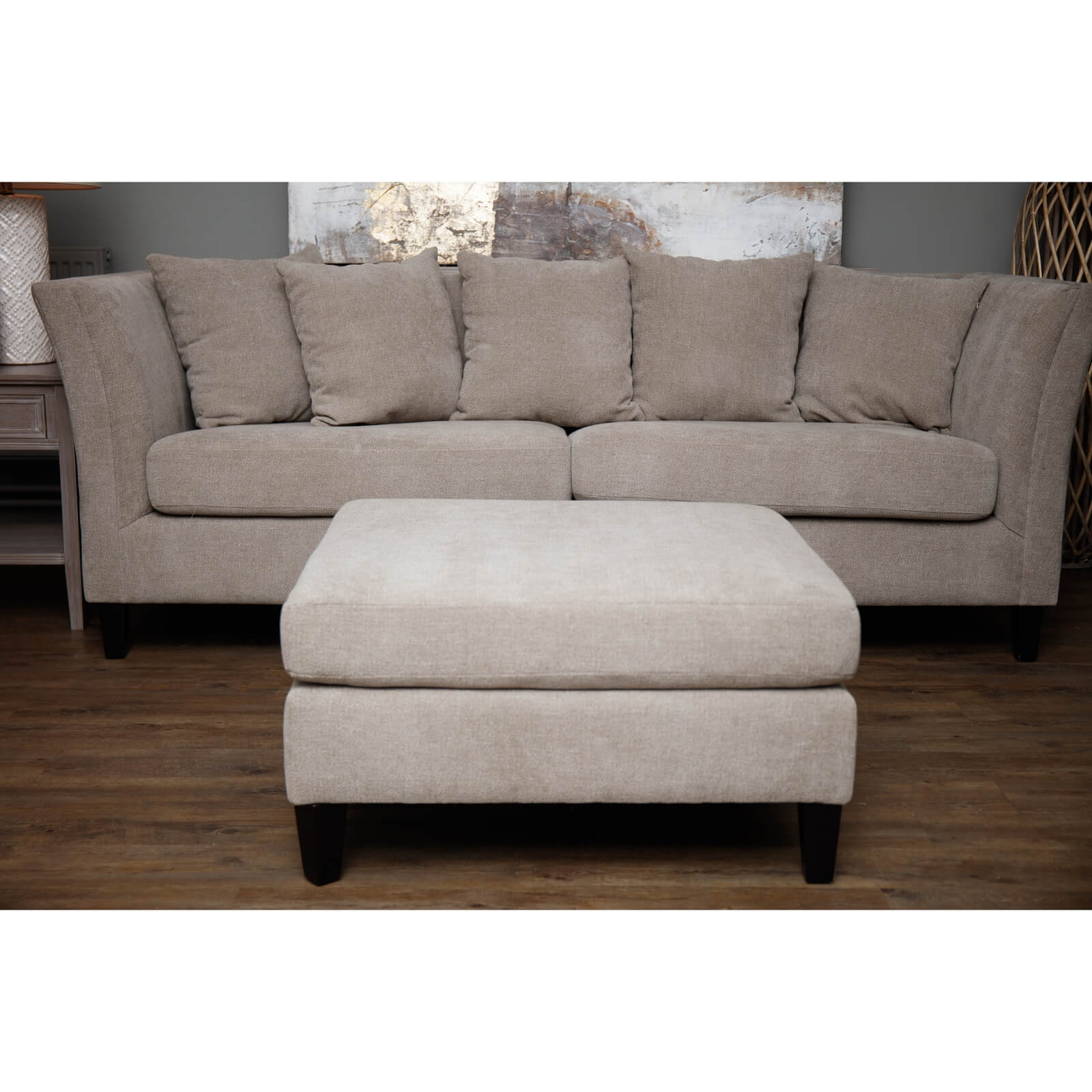 Taupe velvet ottoman footstool with wooden legs, plush cushioning, and modern farmhouse style by sostter at brixbailey.com