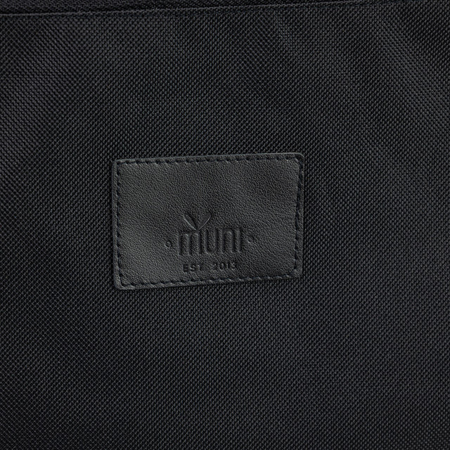 Stylish Black & Tan Leather Backpack – Waterproof & Comfortable by Muni at www.brixbailey.com