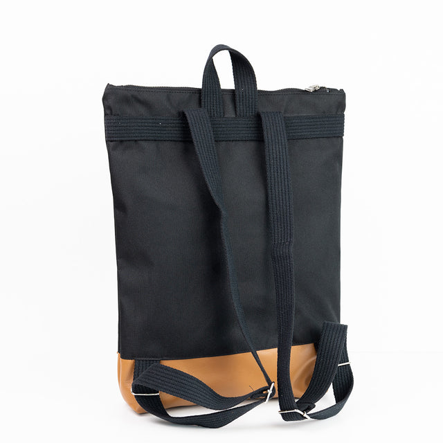 Stylish Black & Tan Leather Backpack – Waterproof & Adjustable by Muni at www.brixbailey.com