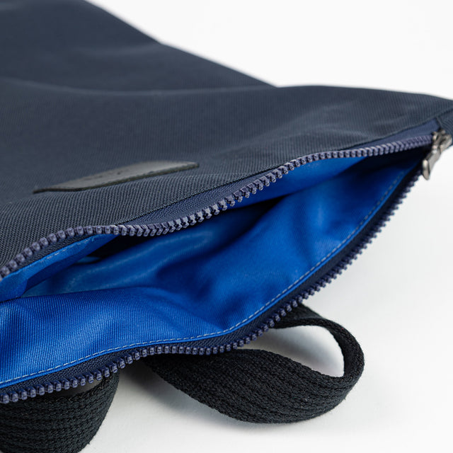 Navy Blue Backpack – Stylish & Spacious for Essentials by Muni at www.brixbailey.com