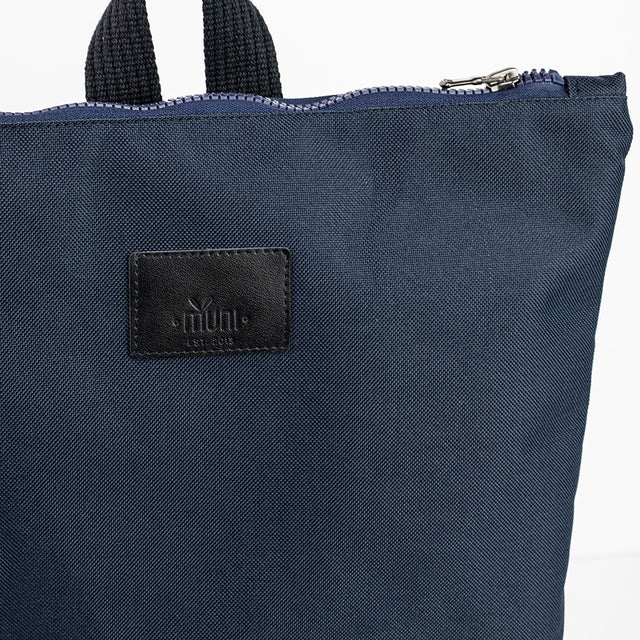 Navy Blue Backpack – Stylish, Roomy & Laptop-Friendly by Muni at www.brixbailey.com