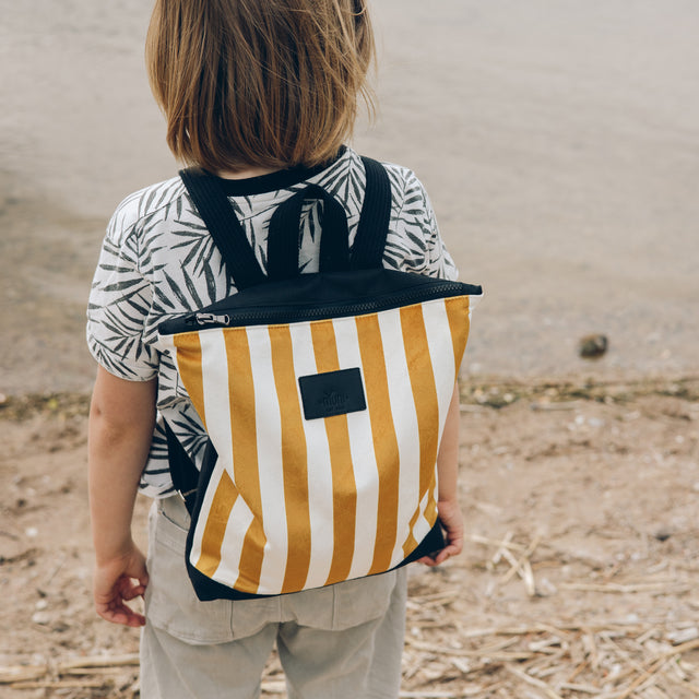 Stylish Striped Mustard Kids Backpack - Durable & Chic by Muni at www.brixbailey.com
