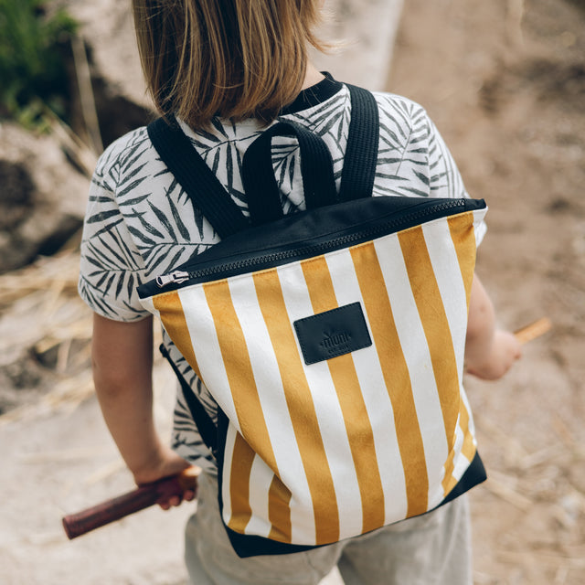 Stylish Striped Mustard Backpack for Kids – Durable & Chic by Muni at www.brixbailey.com