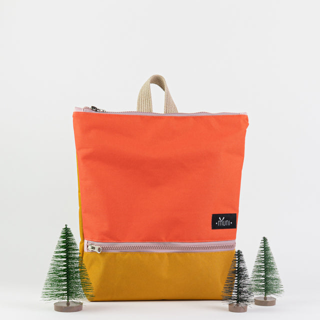Vibrant Orange & Yellow Backpack – Waterproof & Durable by Muni at www.brixbailey.com