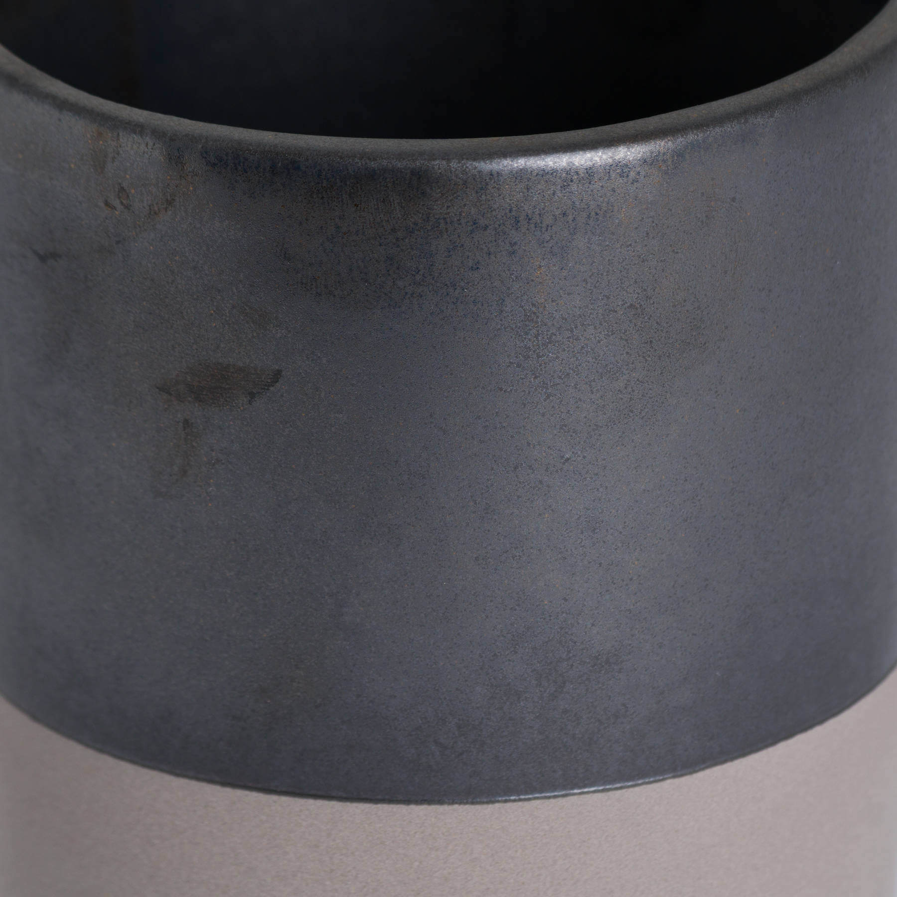 Sleek metallic grey ceramic planter with minimalist design for modern home decor by sostter at brixbailey.com