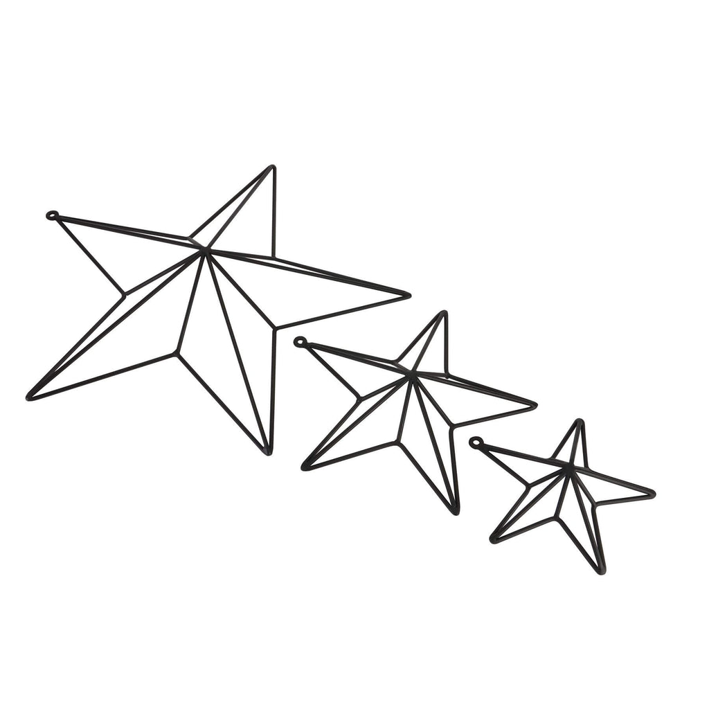 Matte black convex metal star wall art, modern contemporary decor with industrial style, 35cm wide, creates dimensional depth by RoomLondon at brixbailey.com