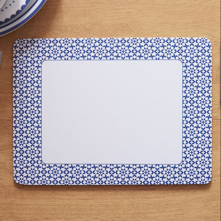 Set of Four Blue Placemats with Stars and Geometric Shapes