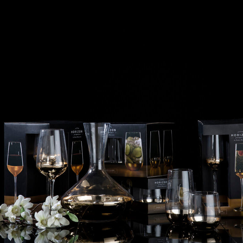 Set of Four Clear Highball Glasses with Gold Base