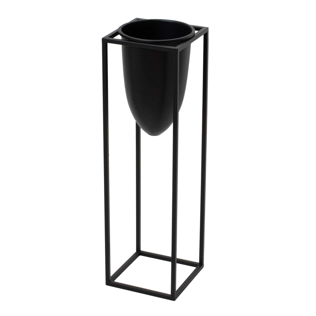 Matte black industrial modern metal planter with sleek bullet design, 62cm tall, for minimalist interiors. by RoomLondon at brixbailey.com