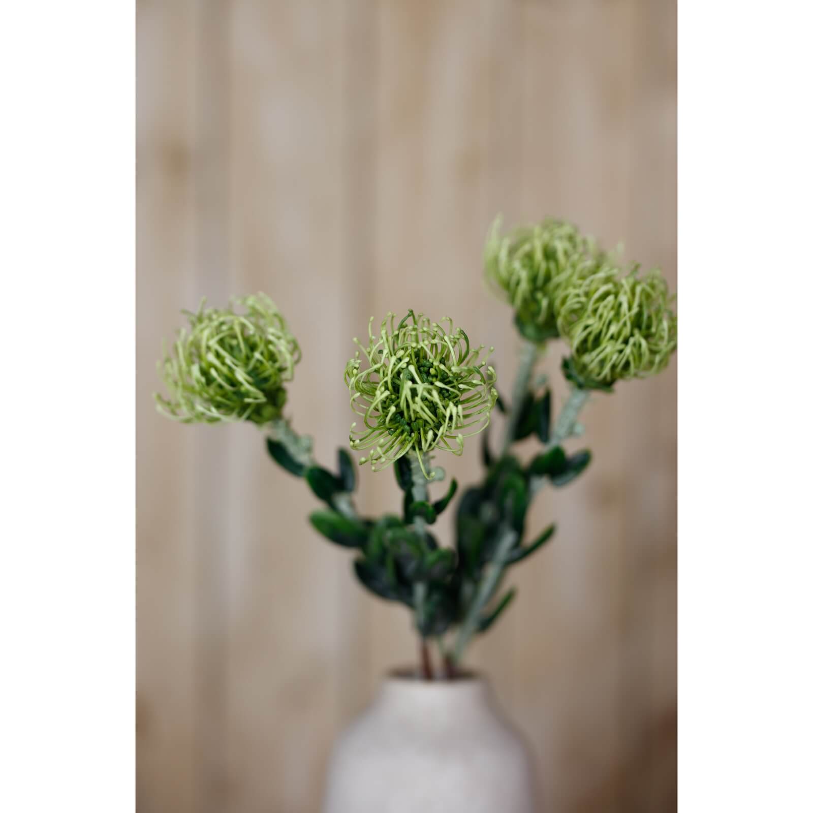 Lifelike pincushion protea spray with spherical blooms and lush green foliage, premium plastic faux botanical decor by sostter at brixbailey.com