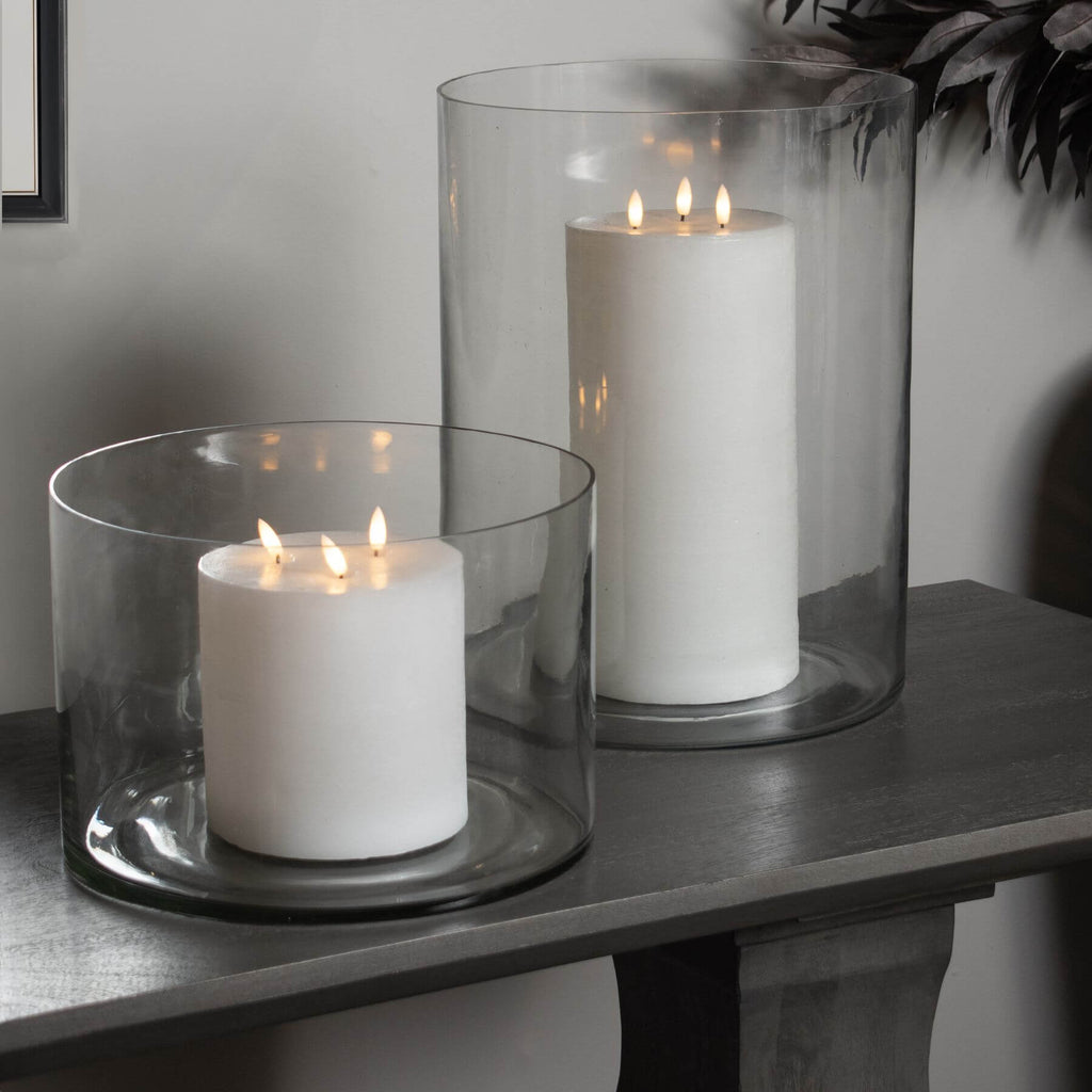 Clear glass Tasman cylinder vase, 40cm tall, showcasing candlelight or floral arrangements in modern home decor by RoomLondon at brixbailey.com
