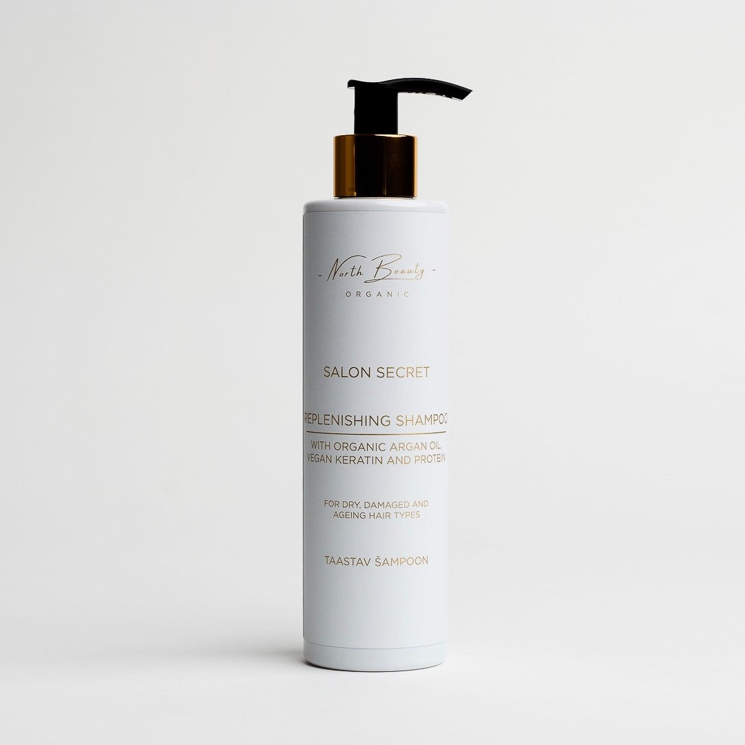 bold close-up of restorative shampoo bottle with vegan keratin and argan oil for strong hair