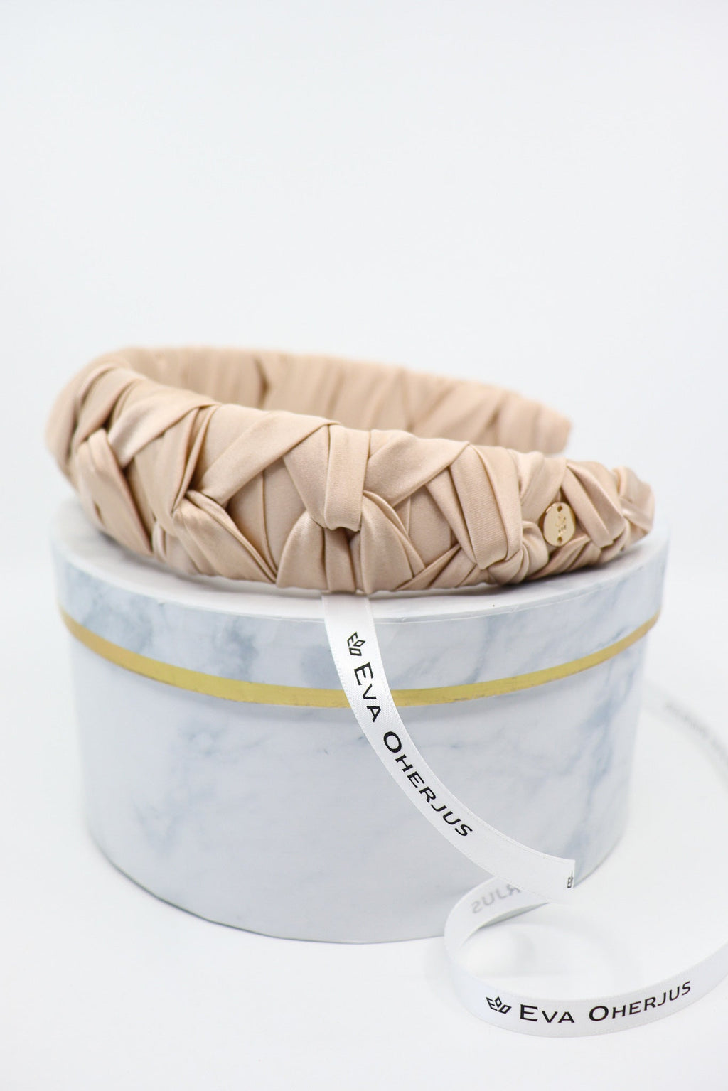 Light Beige Silk Knotted Headband - Crown Design with Metal Logo Tag - Elegant & Durable by Eva Oherjus at www.brixbailey.com