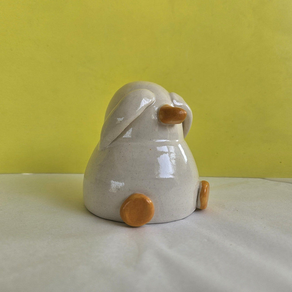 Shy Duck Hiding Ceramic Ornament
