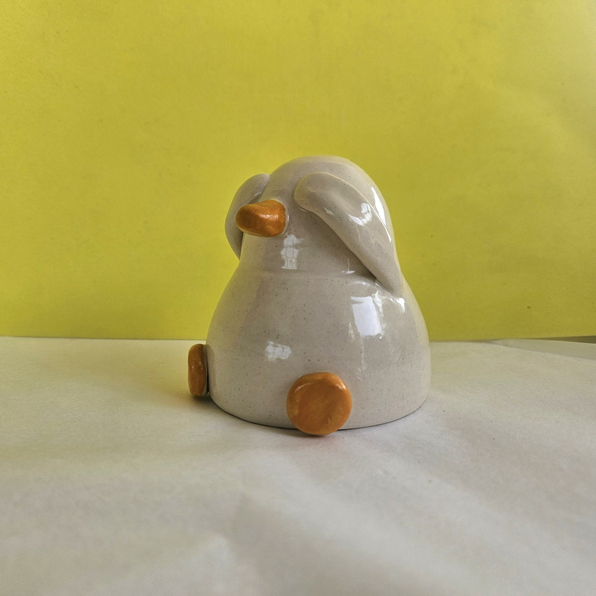 Shy Duck Hiding Ceramic Ornament