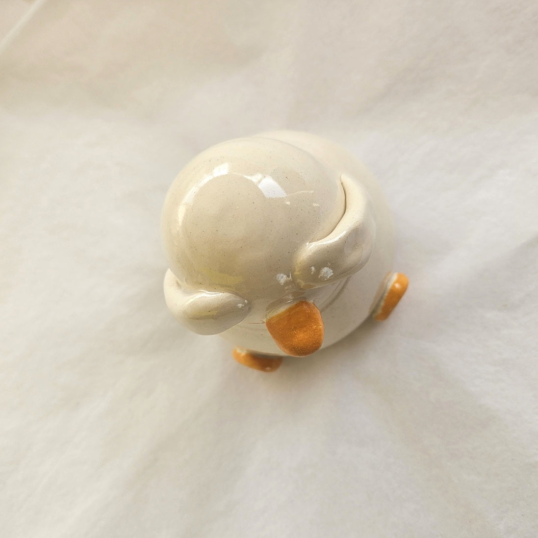 Shy Duck Hiding Ceramic Ornament