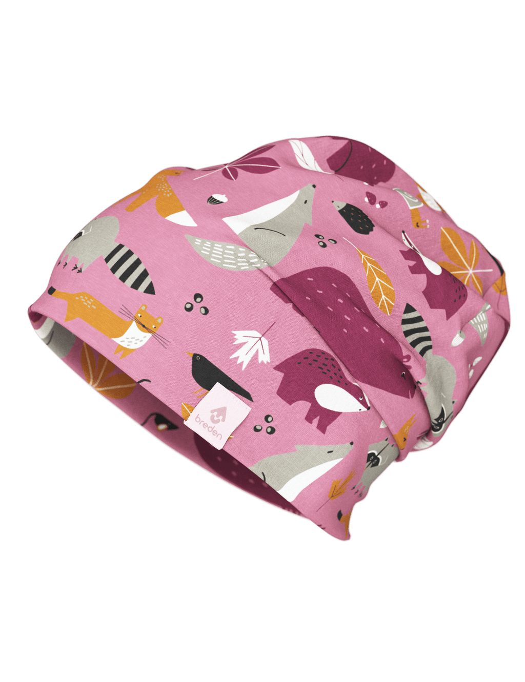 a child laughing in a soft cotton beanie, playfully worn two different ways on a crisp autumn day