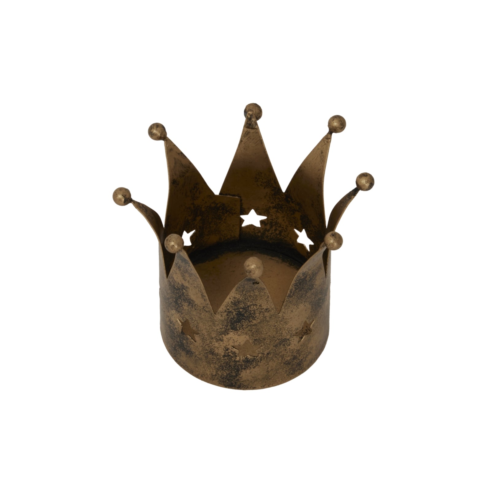 a soft, glowing antique gold crown tealight holder casting a warm, cozy light on a winter evening