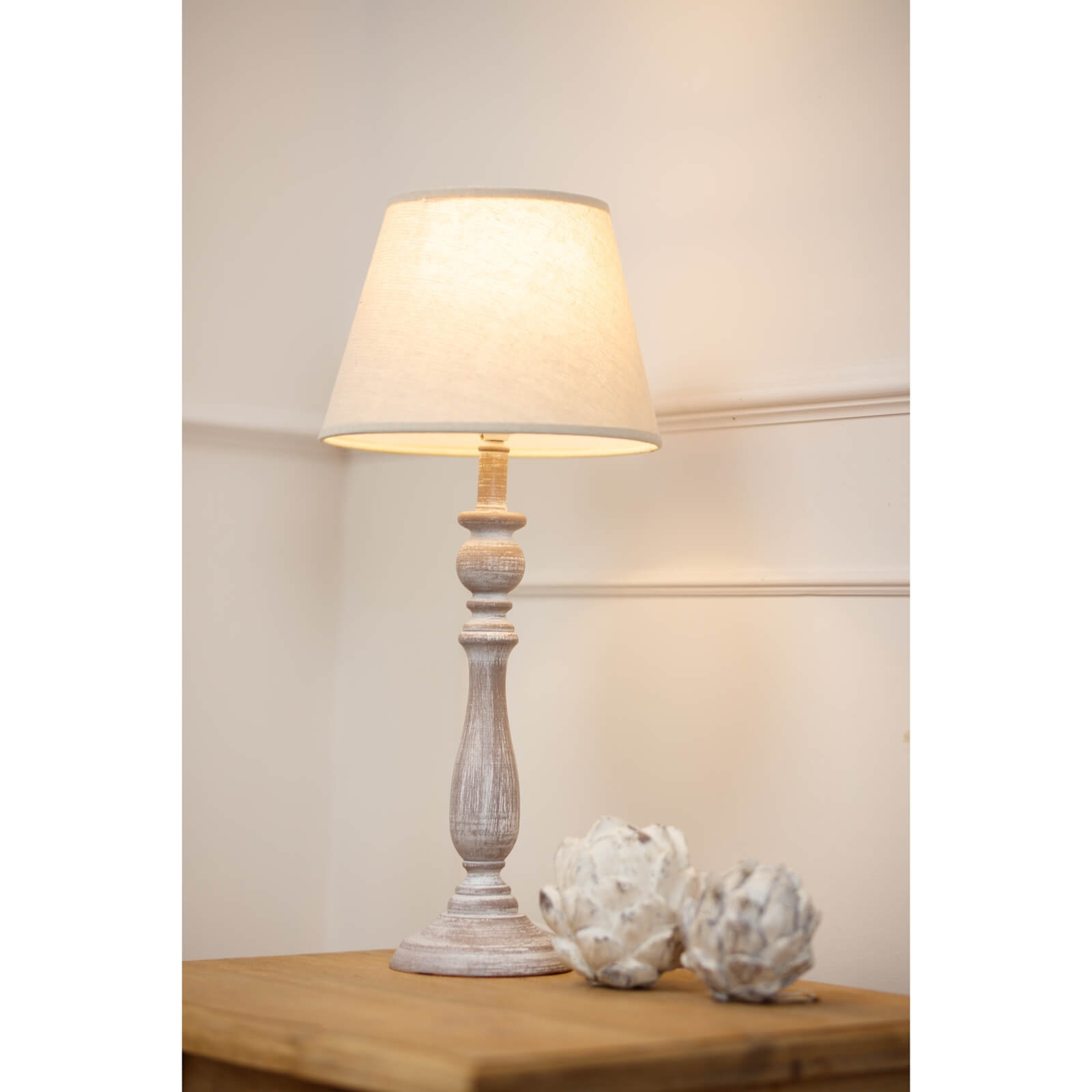 Dunum Column Table Lamp with hand-carved wood base and linen shade, warm white finish, 44cm height for bedside or console by Sostter at brixbailey.com