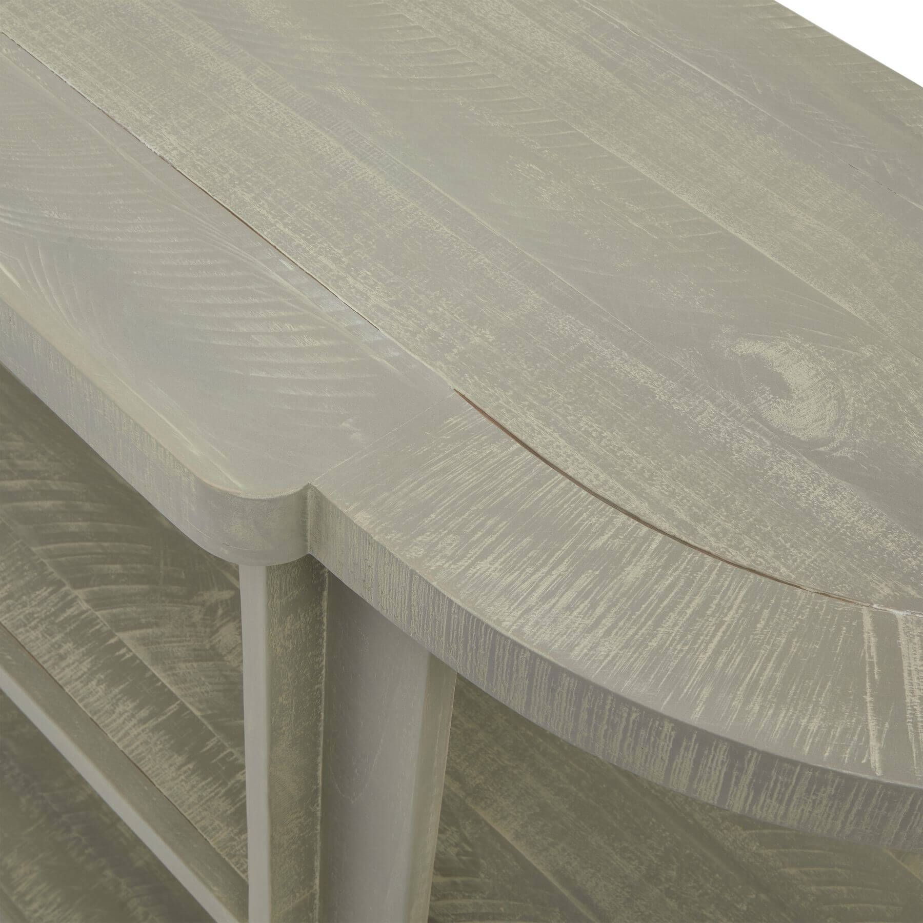 Hand-finished grey-washed pine console table with organic curves, natural wood grain, and contemporary artisan design. by RoomLondon at brixbailey.com