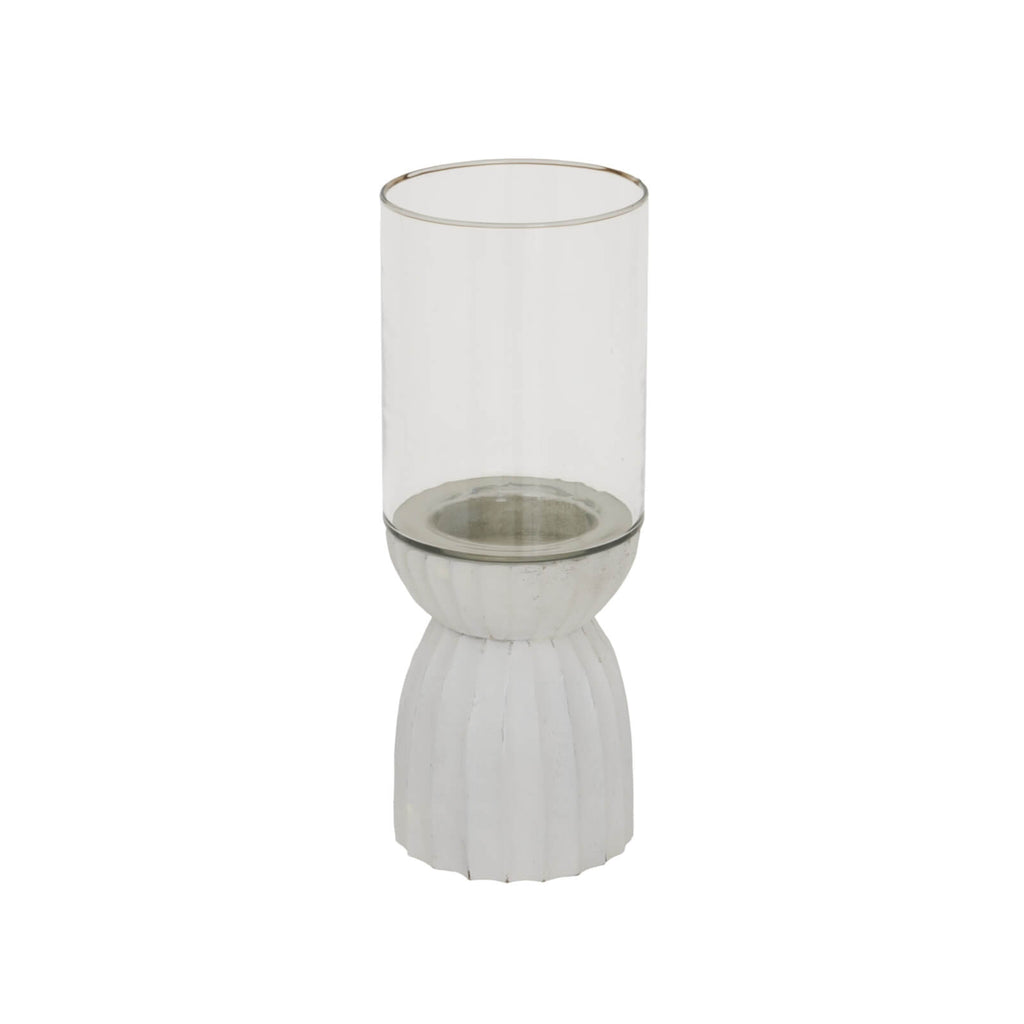 White carved glass hurricane lantern with intricate geometric patterns, warm atmospheric glow, traditional design. by RoomLondon at brixbailey.com