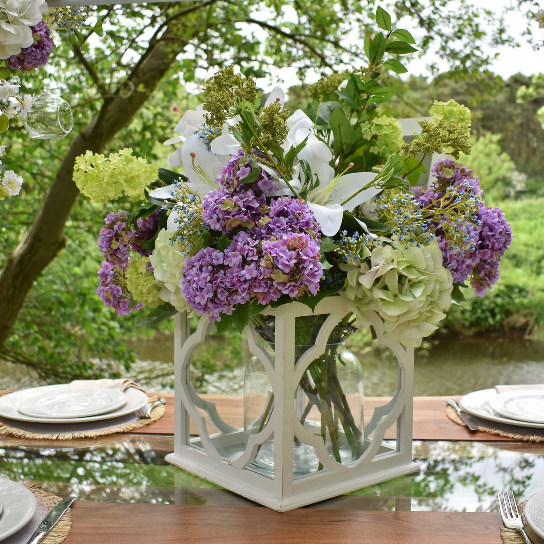 Lifelike artificial hydrangea stem in soft green, 50cm tall, with realistic petals and leaves for elegant home decor by RoomLondon at brixbailey.com