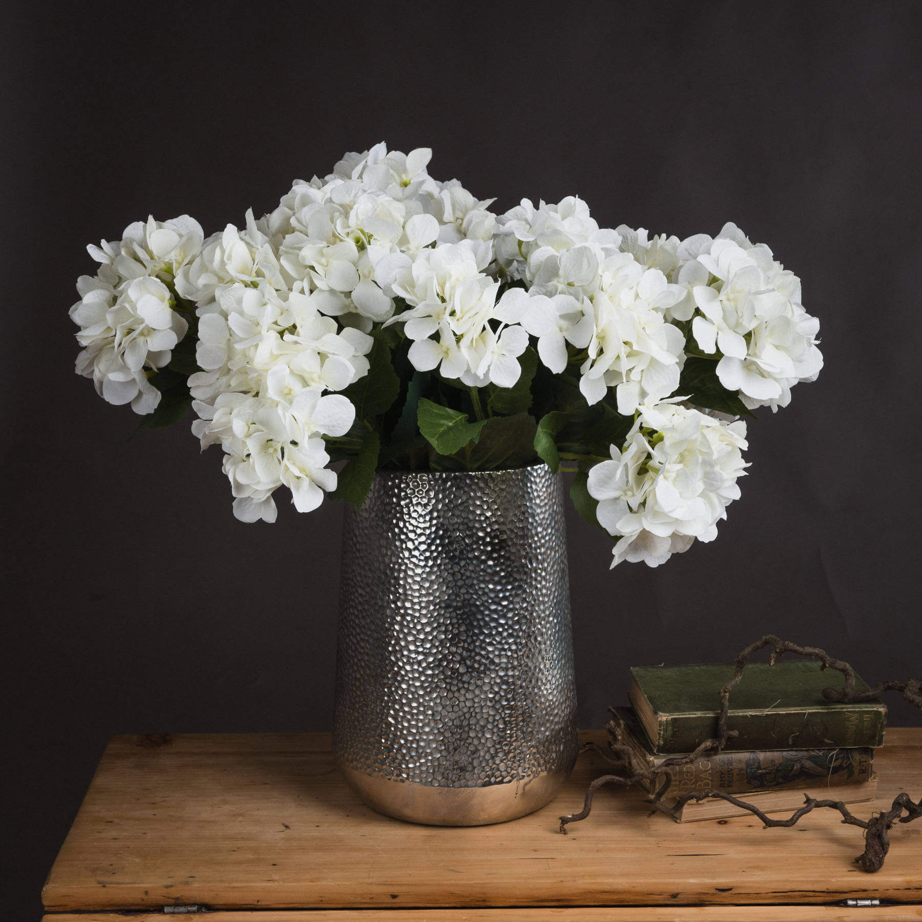 Luxury artificial hydrangea bouquet in creamy off-white, ultra-realistic plastic blooms with natural tonal variations  by sostter at brixbailey.com