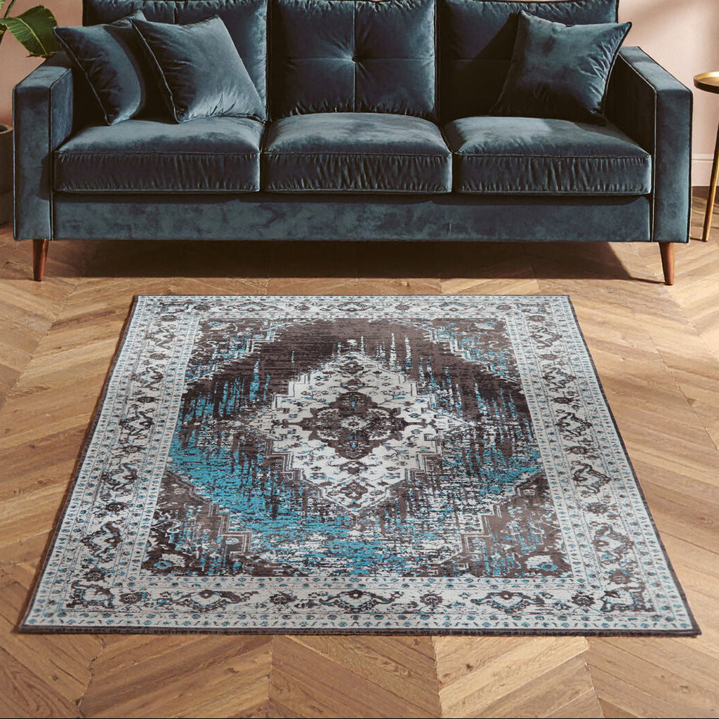Small Teal Rug with Floral Pattern