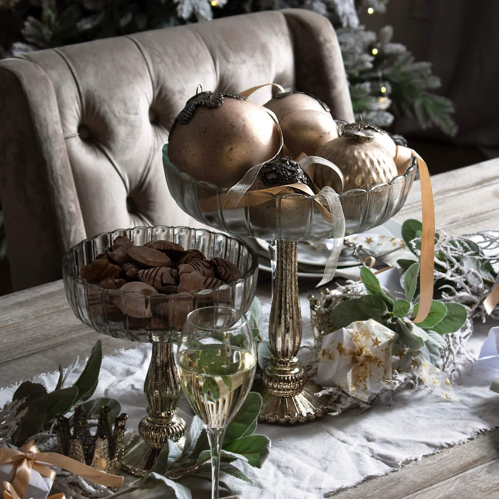 Silver mercury glass bowl with reflective finish, perfect for centerpieces or decorative displays, 23cm height. by RoomLondon at brixbailey.com
