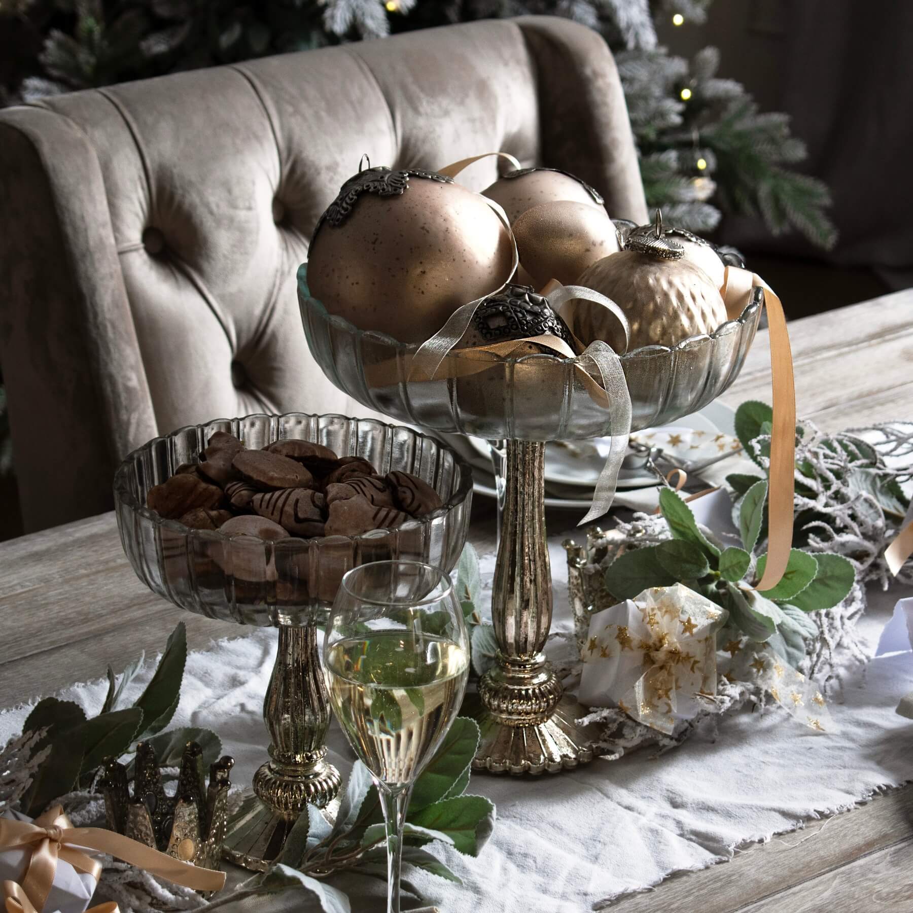 Silver mercury glass bowl with reflective finish, perfect for centerpieces or decorative displays, 23cm height. by RoomLondon at brixbailey.com
