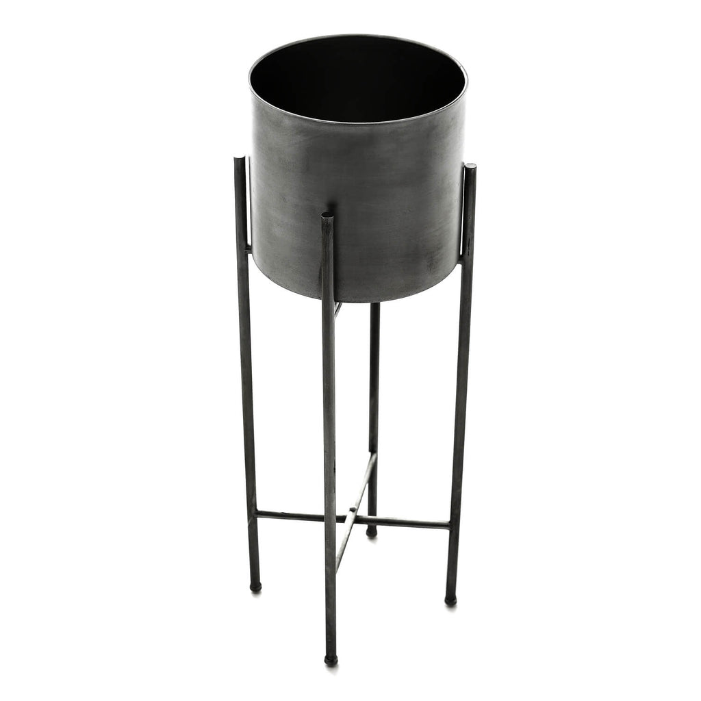 Silver metal planters on tall stand, modern reflective finish, perfect for home decor. by Sostter at brixbailey.com