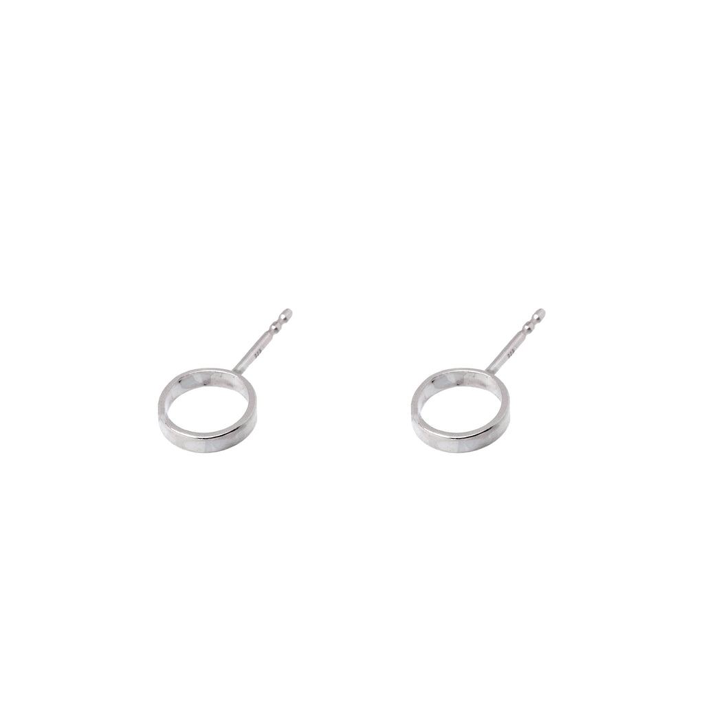Minimalist Silver Circle Earrings – Understated Elegance by Maarja Palu by Maarja Palu at www.brixbailey.com