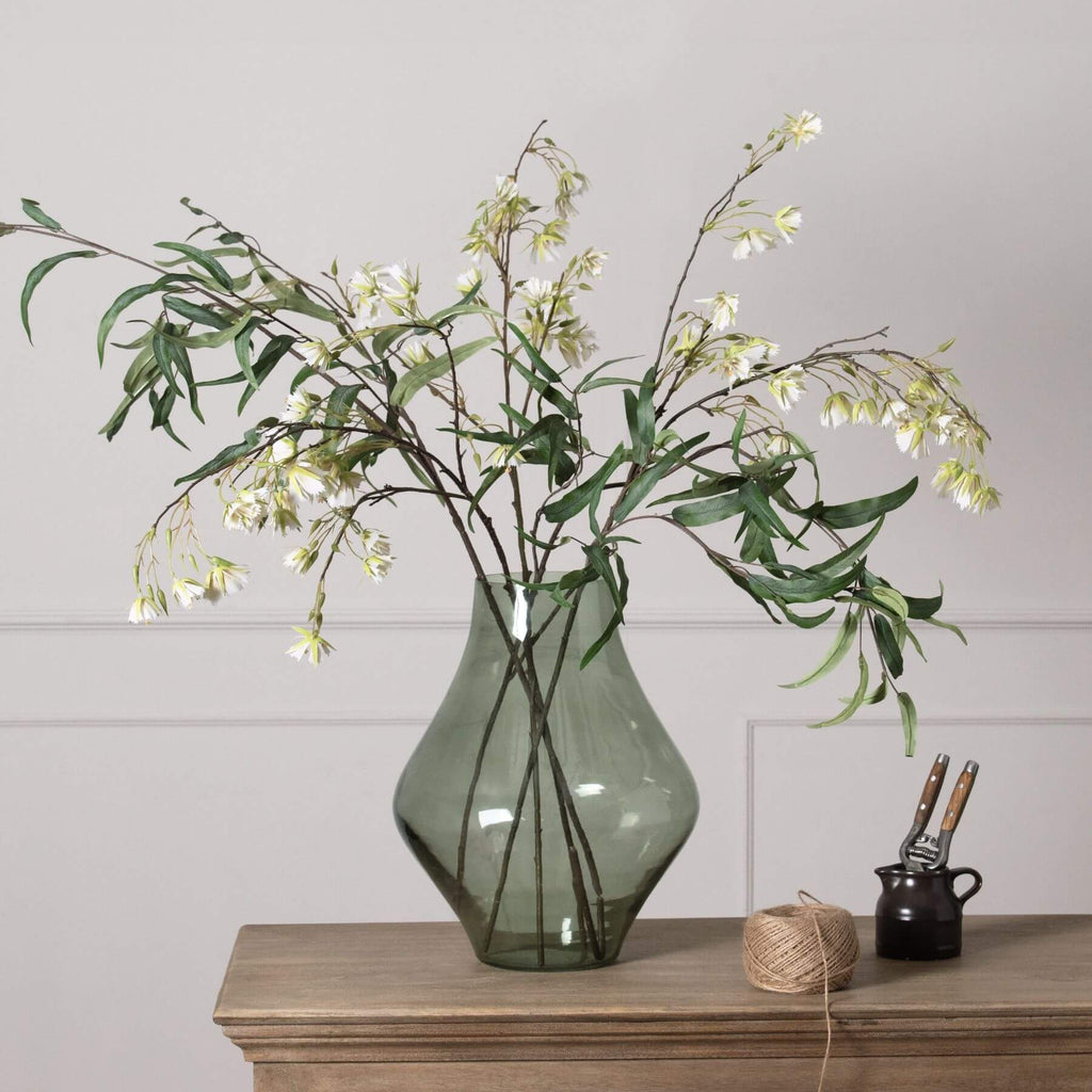 Handcrafted sage green glass vase with minimalist design, matte finish, and modern platform silhouette for home decor. by RoomLondon at brixbailey.com