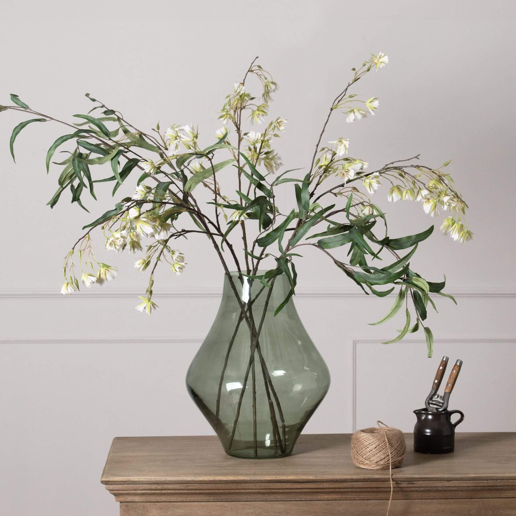 Handcrafted sage green glass vase with minimalist design, matte finish, and modern platform silhouette for home decor. by RoomLondon at brixbailey.com