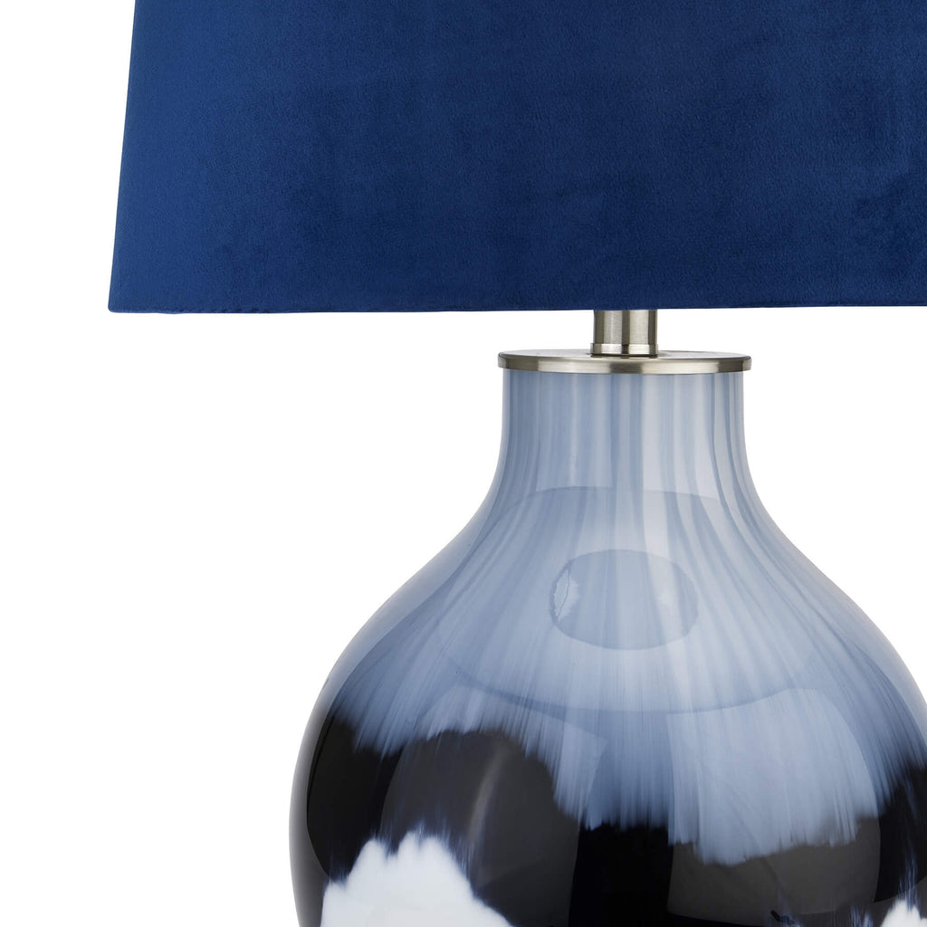 Handcrafted Ice Shadows table lamp with blue and white glaze, navy velvet shade, and elegant ball finial. by RoomLondon at brixbailey.com