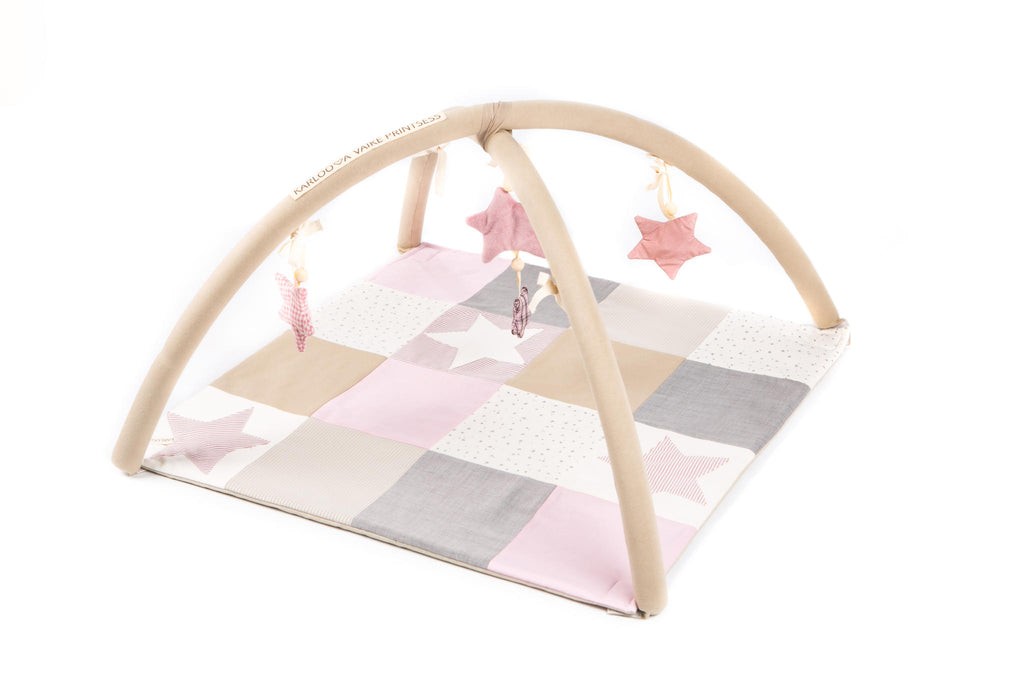 Handmade Baby Activity Mat with Starry Arch – Stimulates Vision & Motor Skills by Karloova at www.brixbailey.com