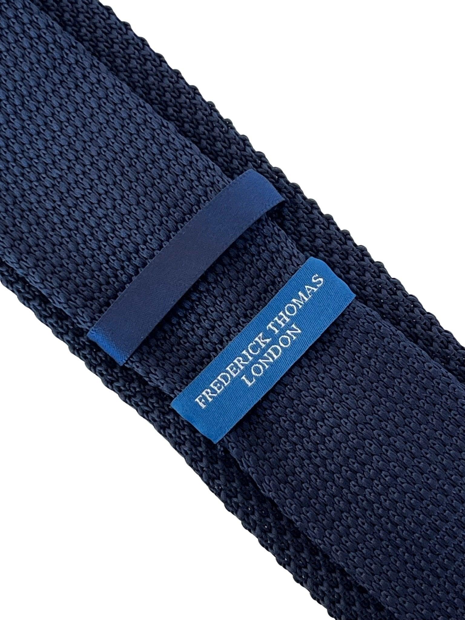 Navy Blue Knitted Tie with White Fleur de Lis Design