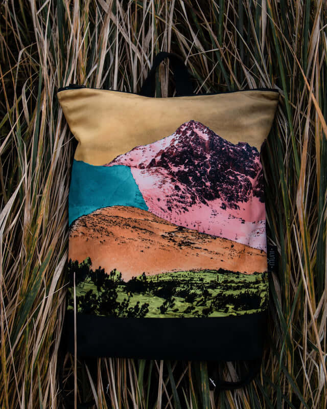 Bold Mountains Backpack – Stylish & Spacious for Every Day by Muni at www.brixbailey.com
