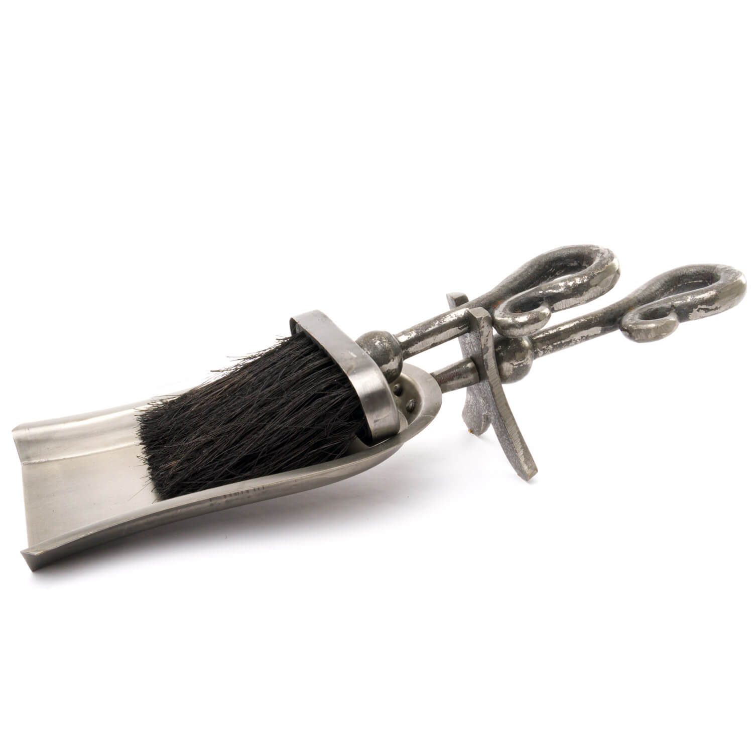 Antique pewter crook-handled hearth tidy with lustrous metallic finish for fireplace ash cleanup and elegant decor. by sostter at brixbailey.com