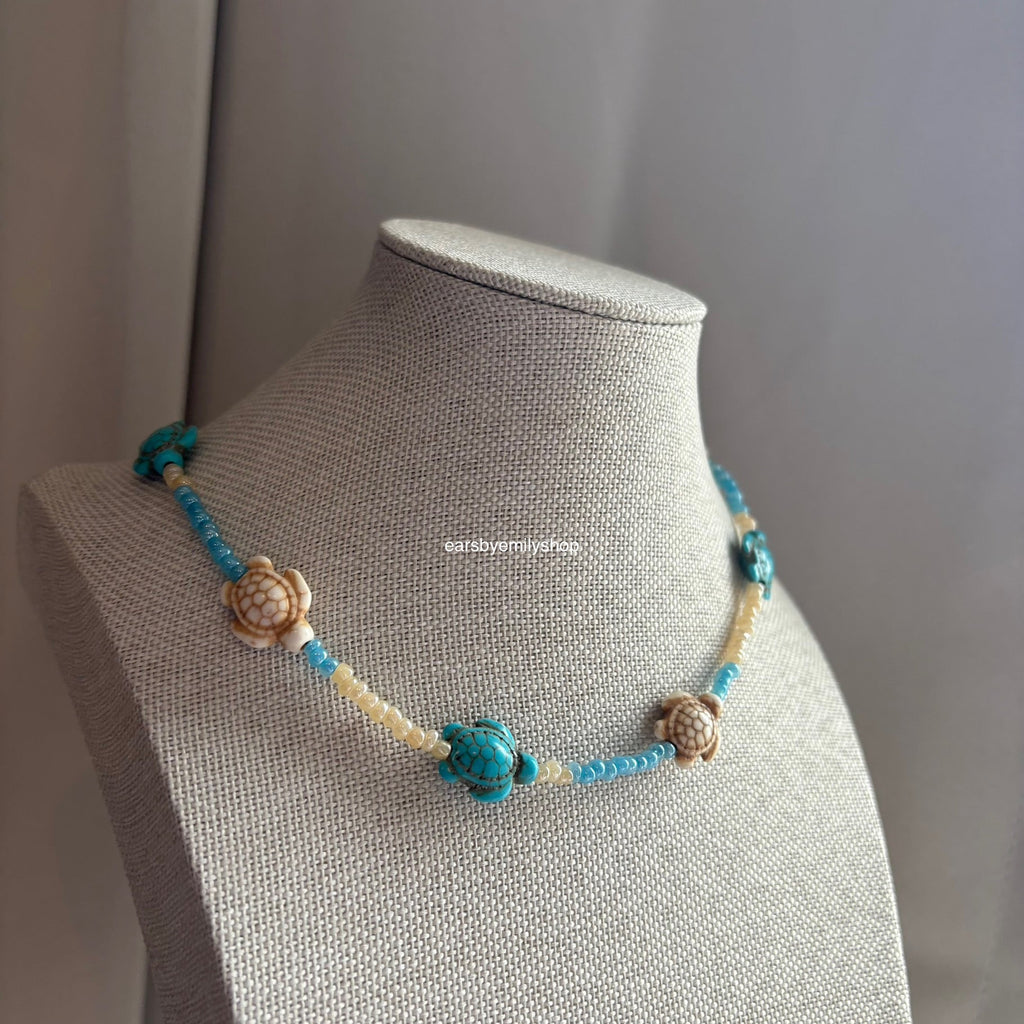 Cool quirky handmade blue and cream beaded beach ocean turtle necklace