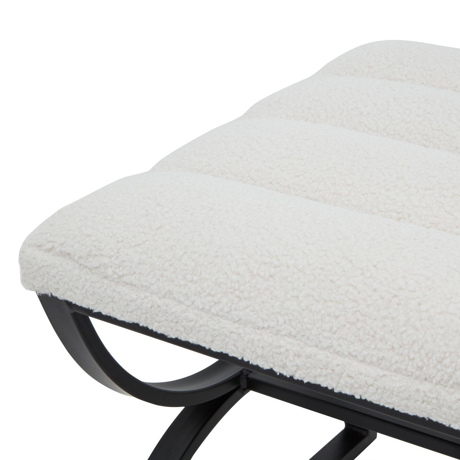 Cream ribbed boucle footstool with black curved metal legs, plush textured upholstery, modern accent piece by sostter at brixbailey.com