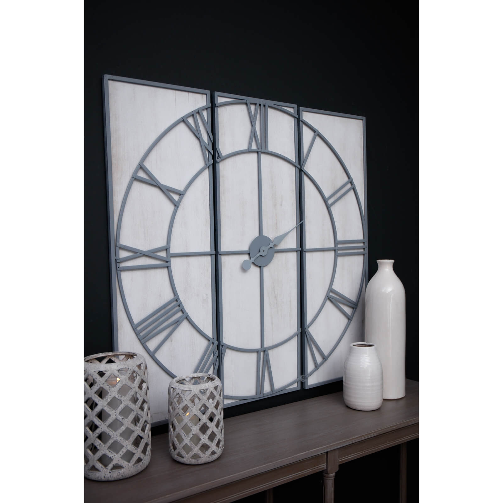 Large silver Roza panelled wall clock with metal frame, modern design, and easy-to-read numerals for home decor by sostter at brixbailey.com