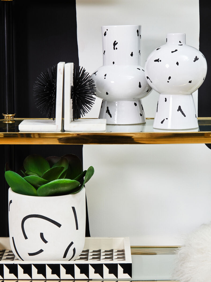 Set of Two Black Starburst Bookends with Marble Base