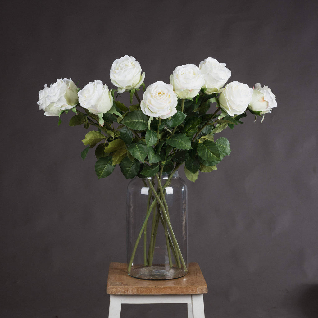 Lifelike white artificial rose stem with realistic petals, perfect for home decor or floral arrangements  by sostter at brixbailey.com