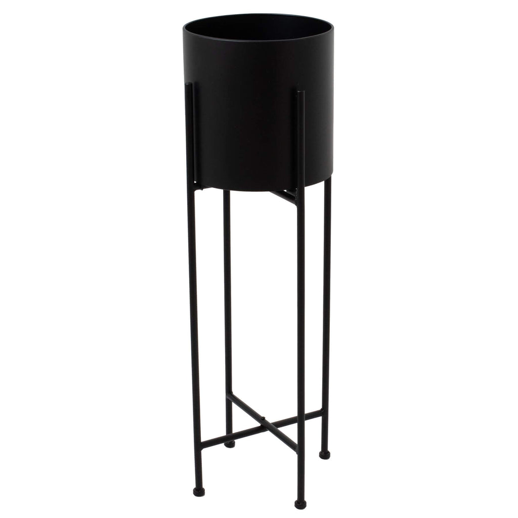 Modern matte black metal planter with geometric base, 84cm tall, for stylish indoor plant display by RoomLondon at brixbailey.com